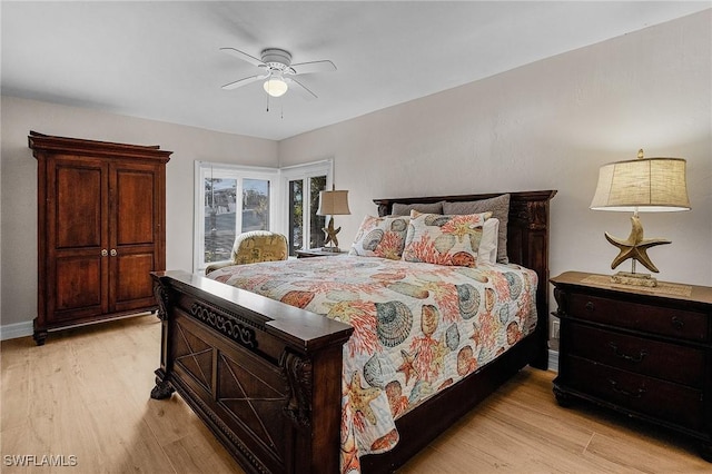 bedroom with ceiling fan and light hardwood / wood-style flooring