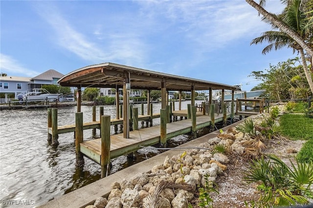 dock area featuring a water view