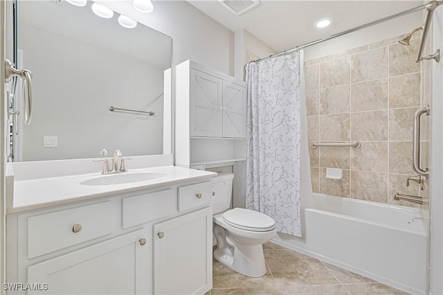 full bathroom featuring toilet, vanity, tile patterned flooring, and shower / bathtub combination with curtain