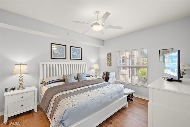 bedroom featuring ceiling fan and wood-type flooring