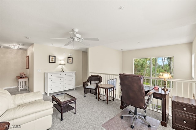 office featuring ceiling fan and light colored carpet