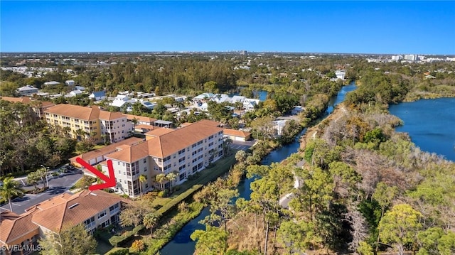 drone / aerial view with a water view