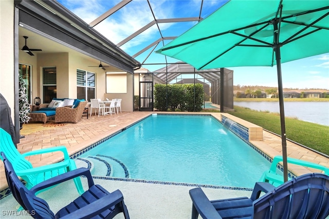 view of pool with a patio area, a water view, ceiling fan, an outdoor living space, and pool water feature