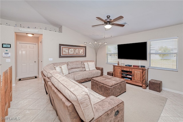 tiled living room featuring vaulted ceiling and ceiling fan