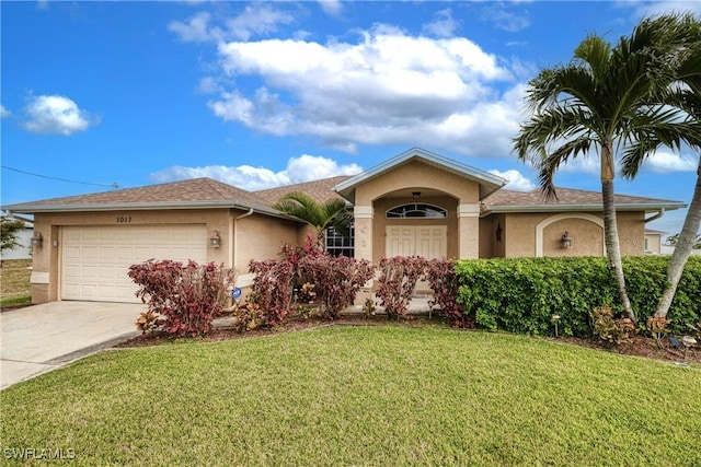 ranch-style home with a front yard and a garage