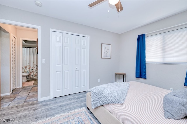 bedroom with light hardwood / wood-style flooring and ceiling fan