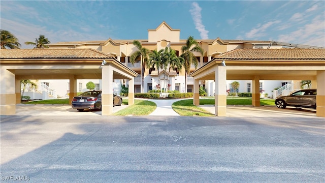 view of front of property with a carport