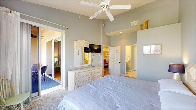 bedroom featuring ceiling fan and light carpet