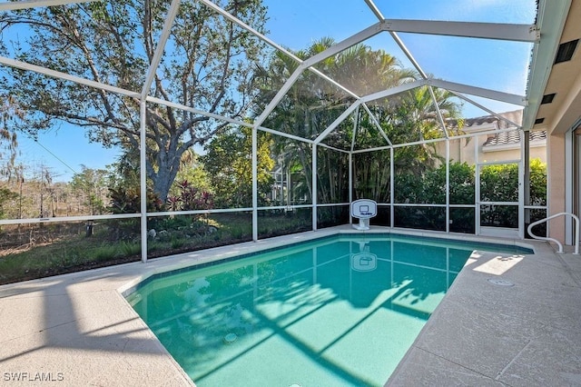 view of pool featuring a patio and a lanai