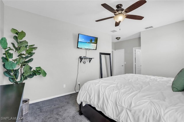 bedroom with ceiling fan and dark colored carpet