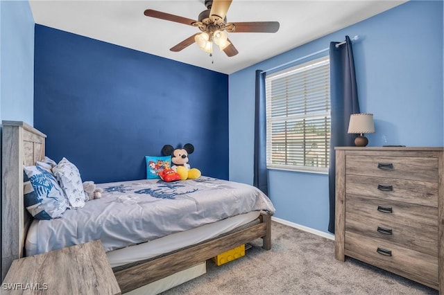 carpeted bedroom with ceiling fan