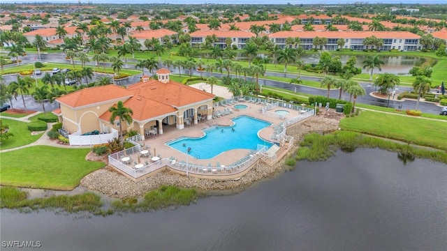 birds eye view of property featuring a water view