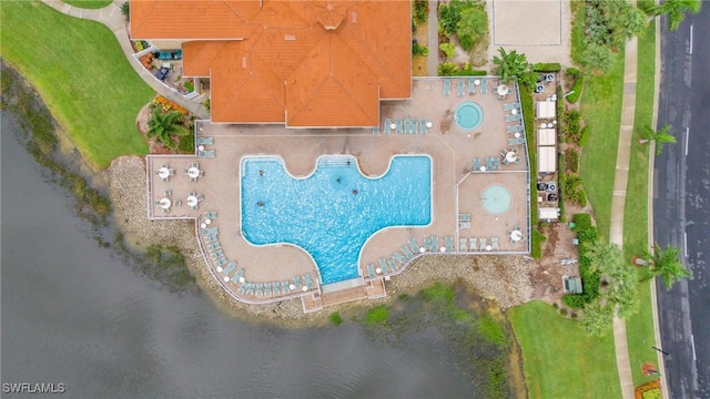 drone / aerial view featuring a water view