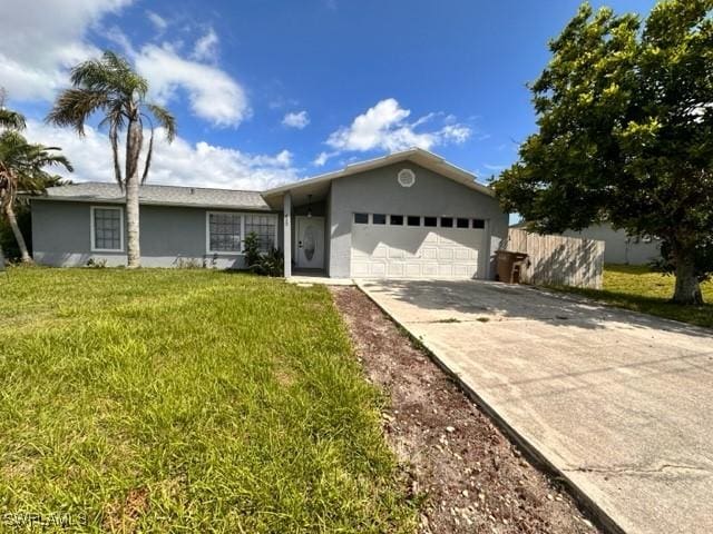 ranch-style house with a front yard and a garage