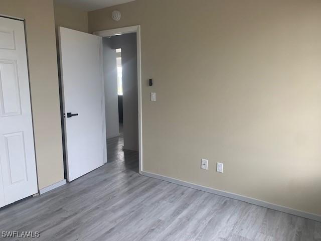 unfurnished bedroom featuring light hardwood / wood-style flooring