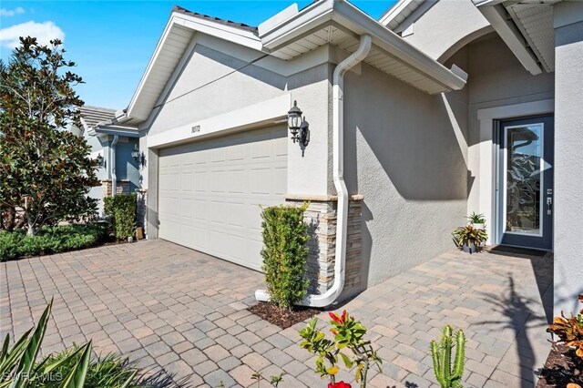 view of side of property with a garage