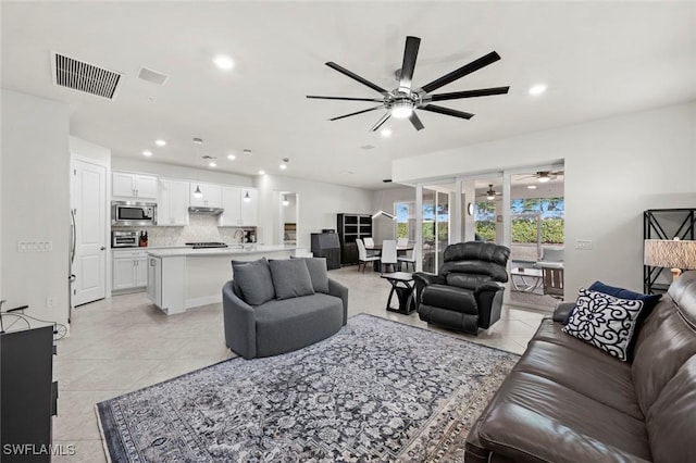 living room with light tile patterned floors