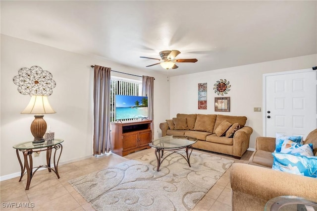 living room with ceiling fan and light tile patterned flooring