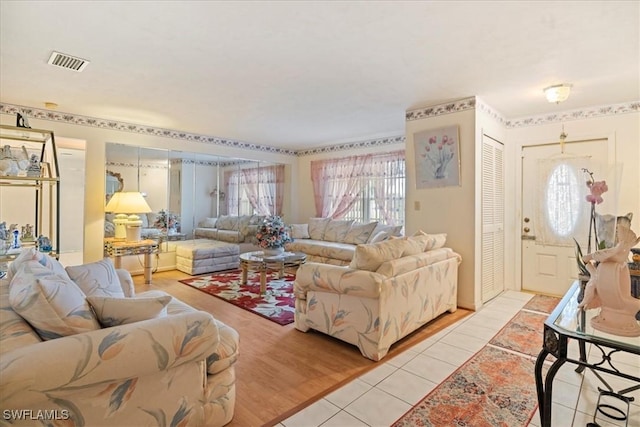 living room with light tile patterned floors