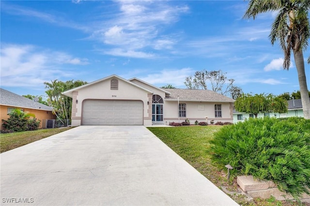 single story home with a front yard and a garage