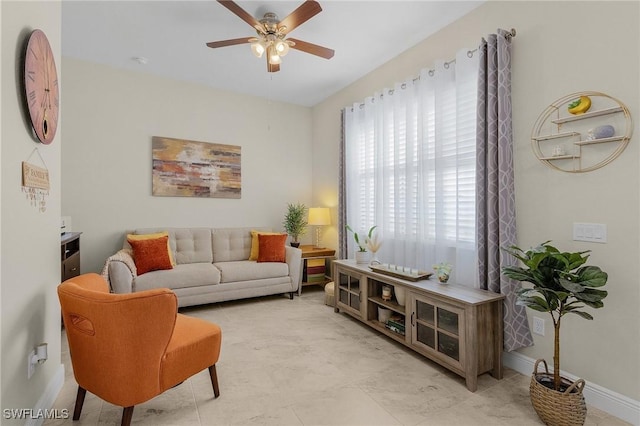 living room with ceiling fan