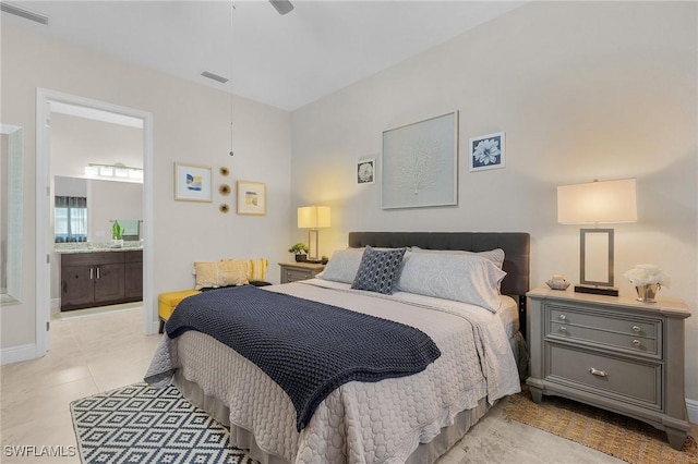 bedroom featuring ceiling fan and connected bathroom