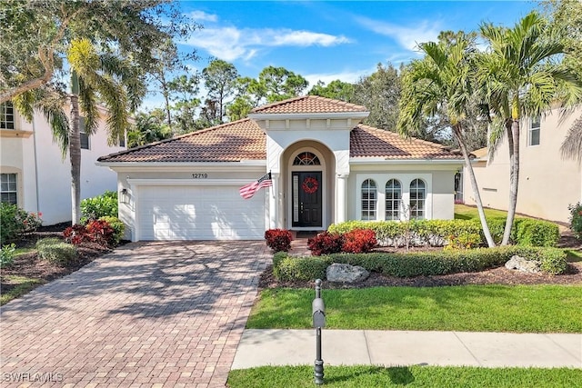 mediterranean / spanish-style house featuring a garage