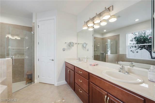 bathroom with vanity, tile patterned floors, and independent shower and bath