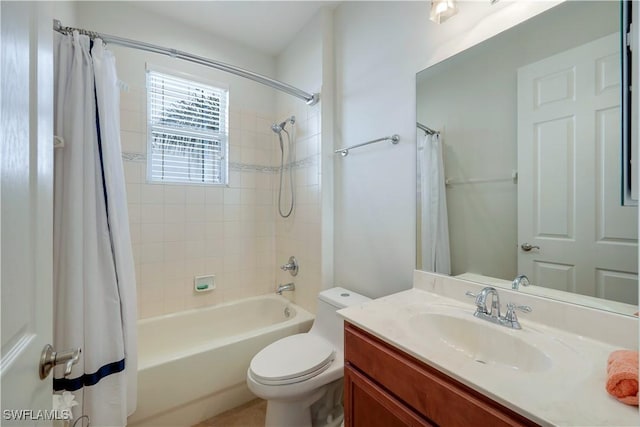 full bathroom featuring toilet, vanity, and shower / tub combo