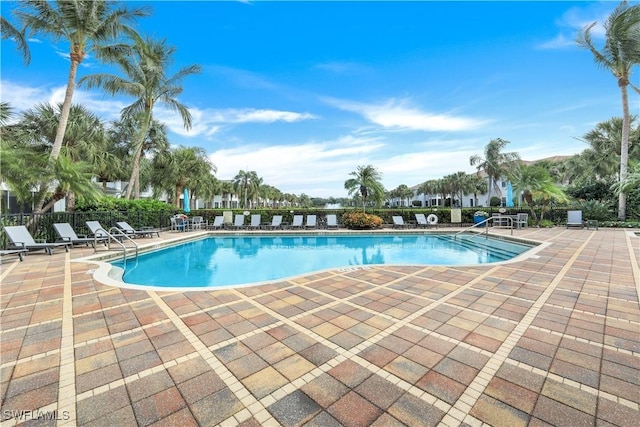 view of swimming pool featuring a patio