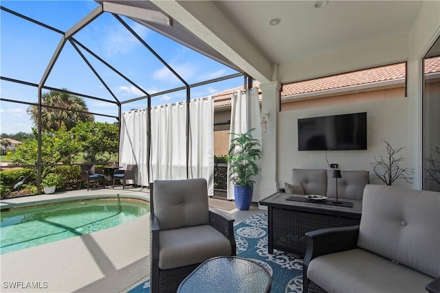 exterior space with glass enclosure and an outdoor living space