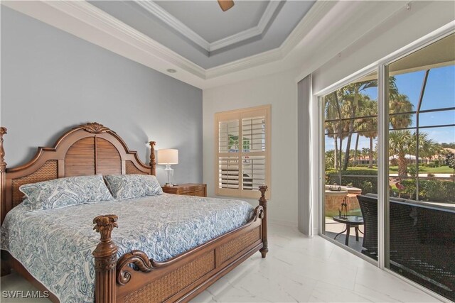 bedroom with ceiling fan, access to exterior, crown molding, and a raised ceiling