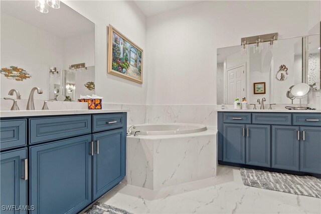 bathroom with a relaxing tiled tub and vanity