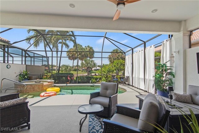 view of patio featuring a pool with hot tub and glass enclosure