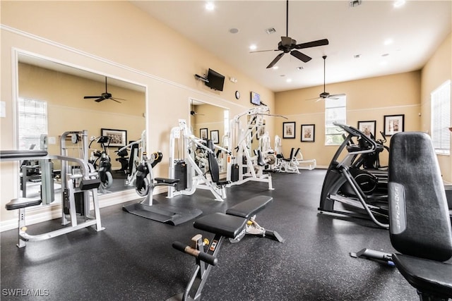 exercise room with ceiling fan