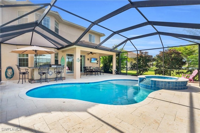 view of swimming pool with a lanai, a patio area, an in ground hot tub, and exterior bar