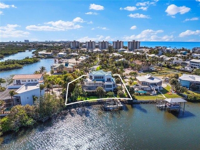 bird's eye view with a water view