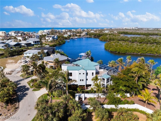 bird's eye view with a water view