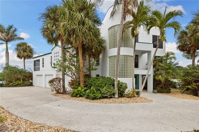 exterior space with a garage