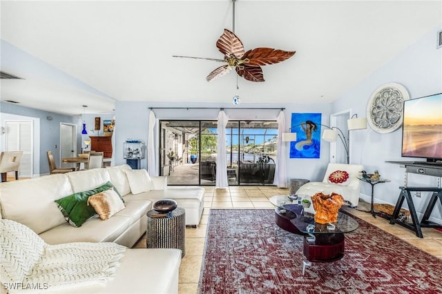 tiled living room featuring ceiling fan