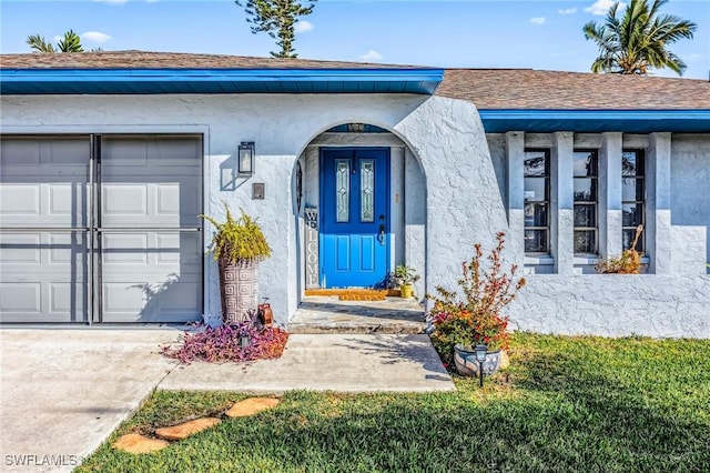 entrance to property with a garage