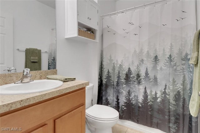 bathroom with tile patterned floors, toilet, vanity, and a shower with shower curtain