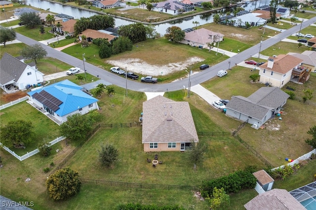 drone / aerial view featuring a water view