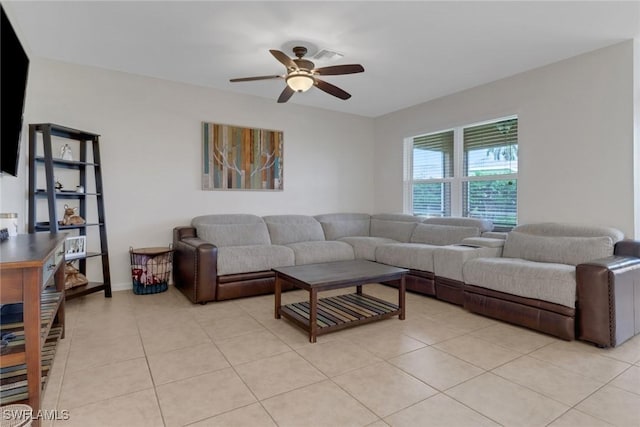 tiled living room featuring ceiling fan