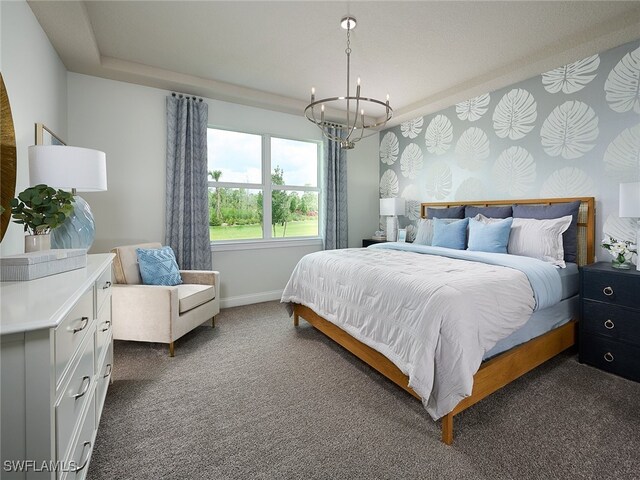 carpeted bedroom featuring a chandelier