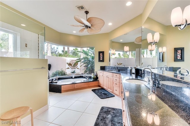 bathroom featuring ceiling fan, tile patterned flooring, plenty of natural light, and vanity