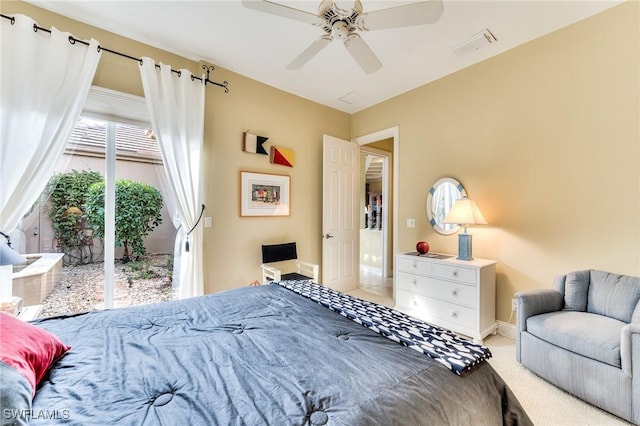 carpeted bedroom featuring ceiling fan and access to outside