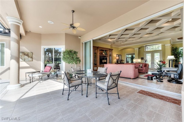 view of patio featuring ceiling fan and french doors