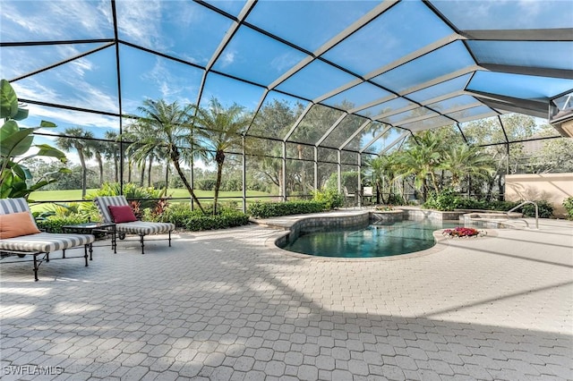 view of swimming pool with a lanai and a patio