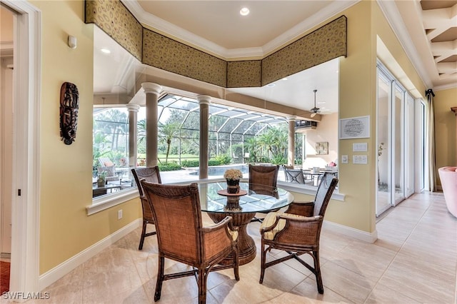 dining space featuring ceiling fan, light tile patterned flooring, and crown molding